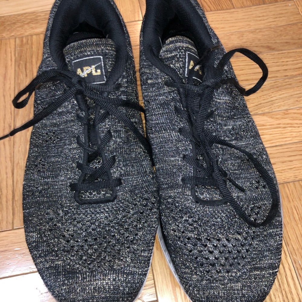 APL black and gold sneaker